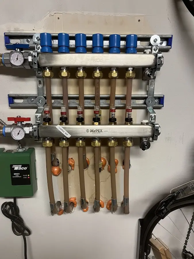 Plumber performing Water Heater Repair at a residential property in East Bridgewater